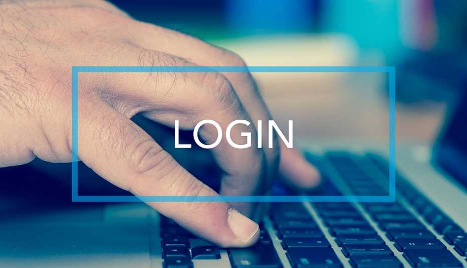 the word login in a square superimposed over a hand on a keyboard