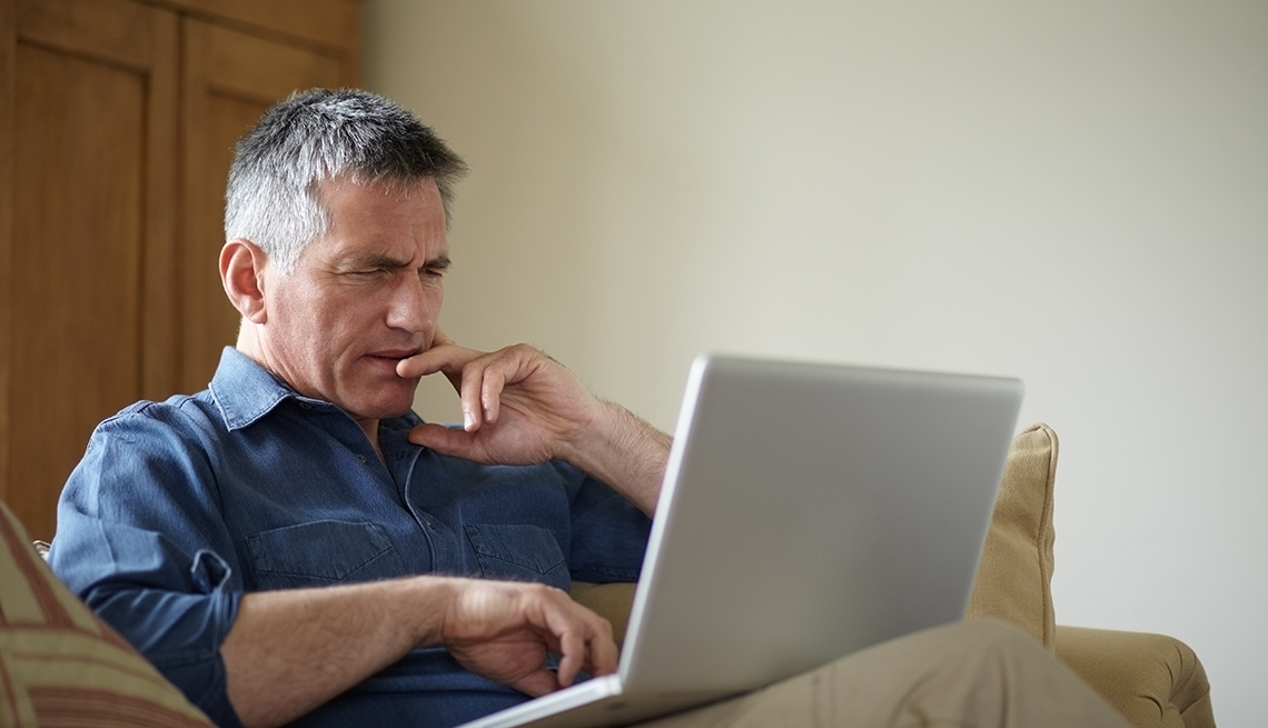 Man looking at laptop