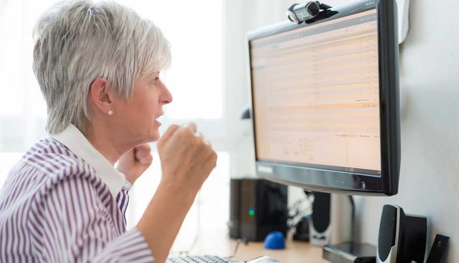 Woman looking at her computer screen