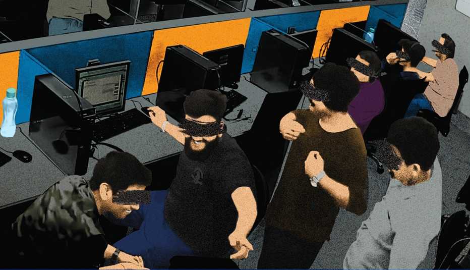 photo of fraud office staff laughing at one of their victims