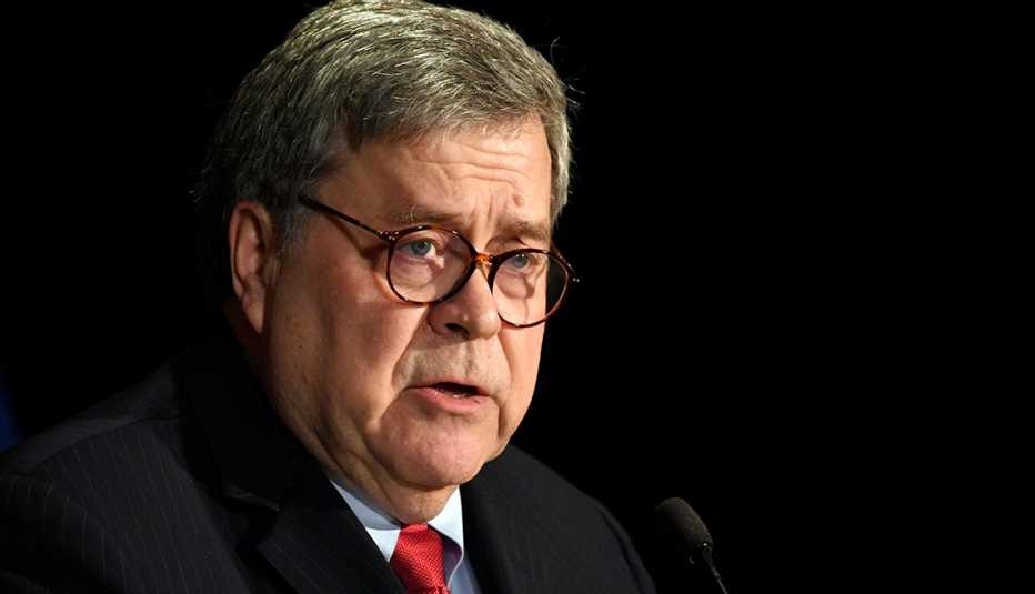 Attorney General William Barr at a podium