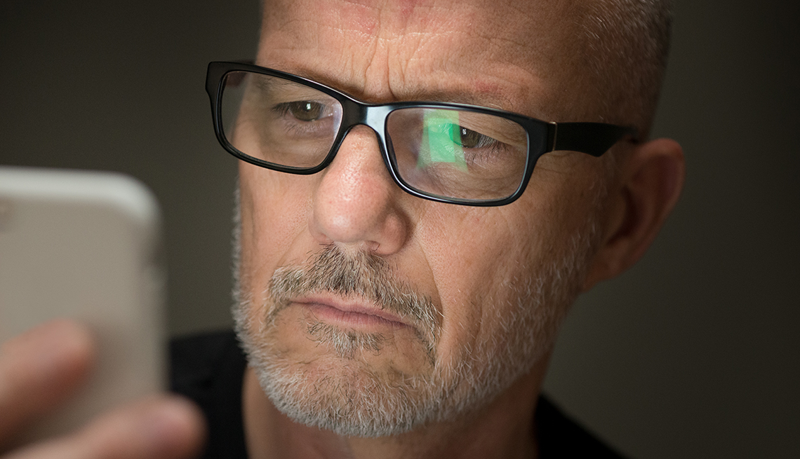 Man looking at his smartphone