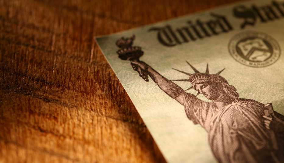 A refund check sits on a table