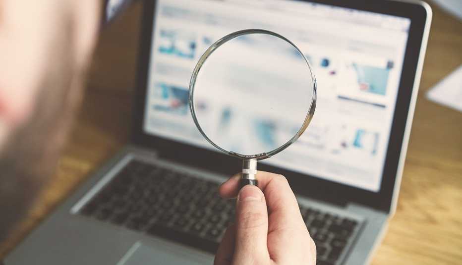 Magnifying glass and computer