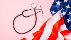 Medical stethoscope and US flag on a pink background signifying advocacy